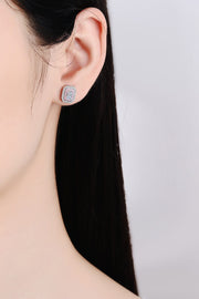 Rectangular pink-bordered stud earring worn on an ear
