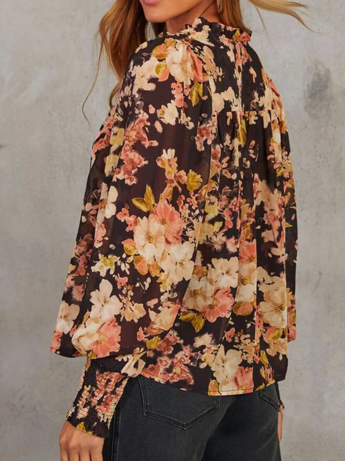 Women's floral V-neck puff-sleeve blouse, model side view