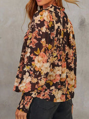 Women's floral V-neck puff-sleeve blouse, model side view