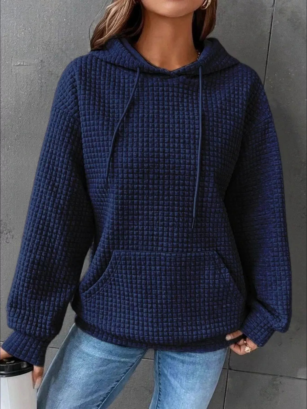 Navy textured hoodie with kangaroo pocket, front view
