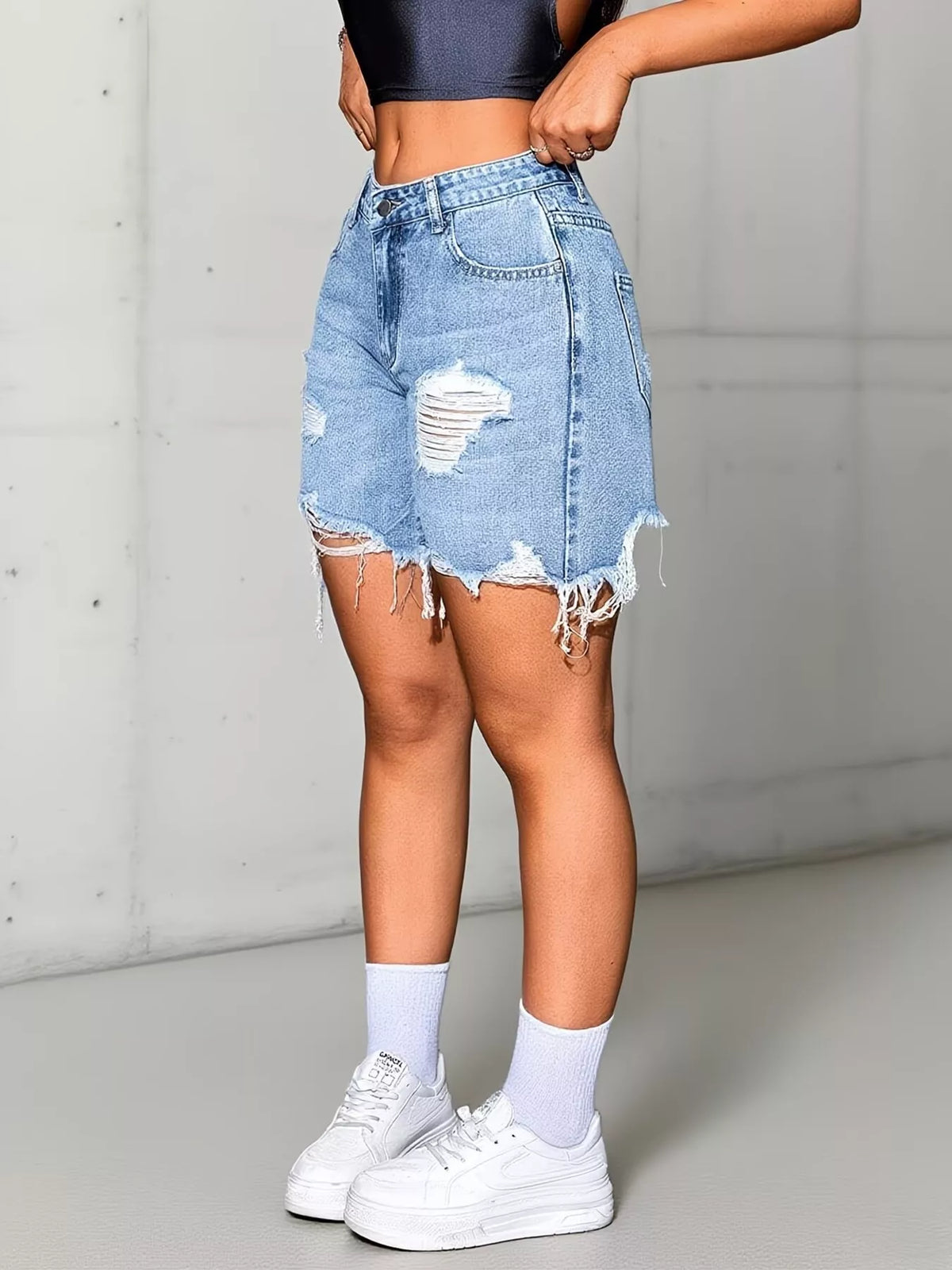 Distressed high-waist denim shorts