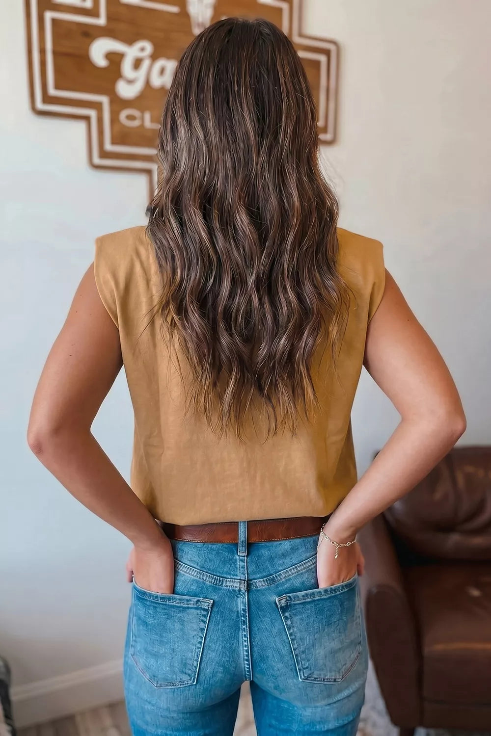 Back view of taupe sleeveless tank top