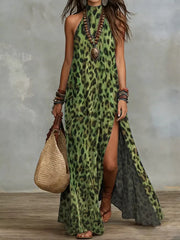 Green leopard-print halter maxi dress with a high side slit, full-length front view.