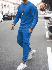 Model wearing blue long-sleeve top and jogger pants set