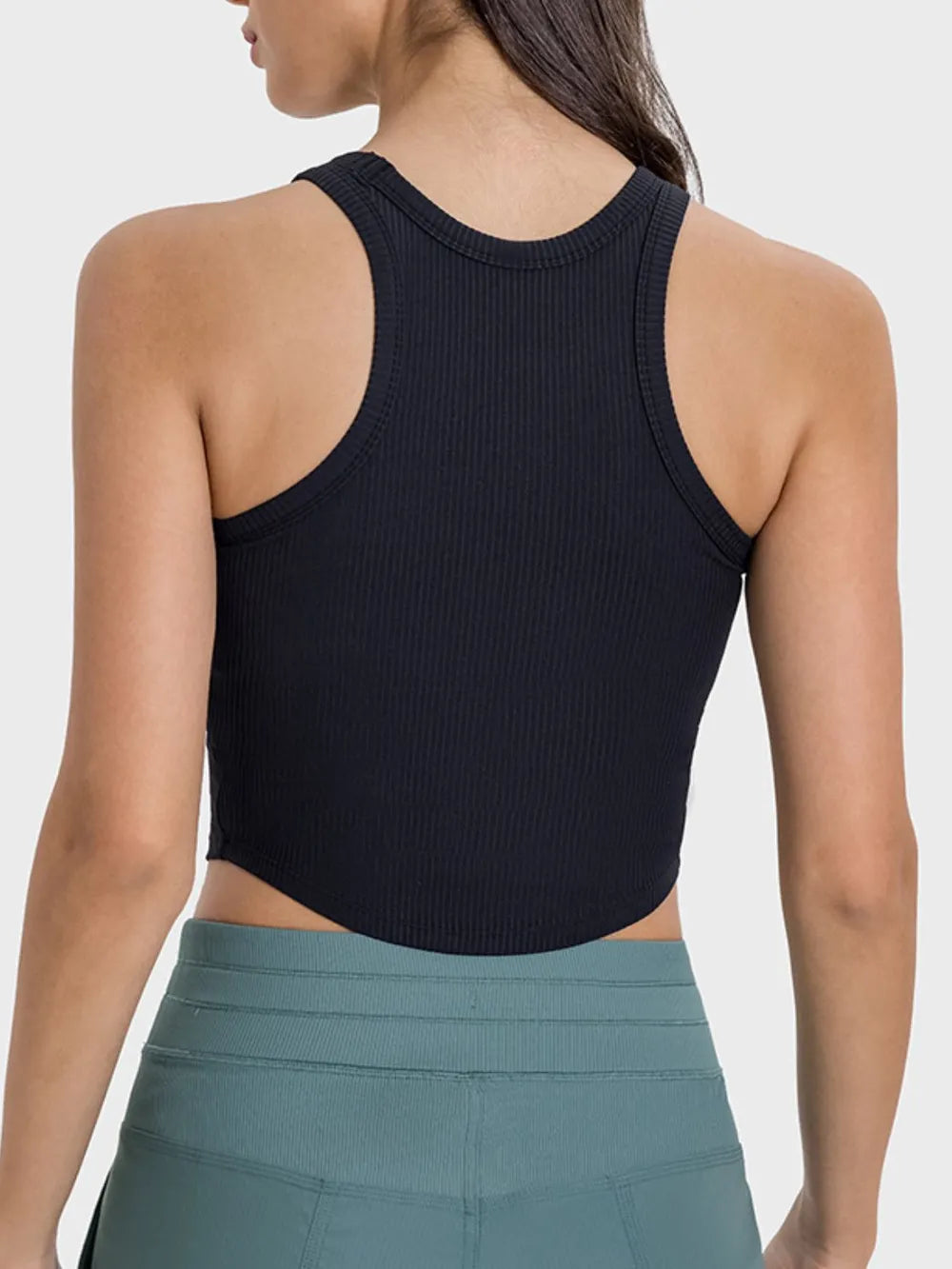 Back view of black racerback tank with teal joggers