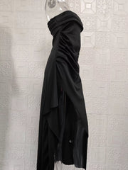 Black maxi dress showing ruched side drape