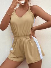 Close view of tan romper neckline and elastic waist