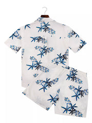 Back view of a white tropical-print shirt and matching shorts set