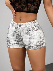 Grey leopard-print denim shorts showing belt loops and stitched hems, front view