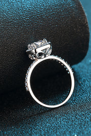 Underside view of square halo ring showing its open gallery and stone-set band.