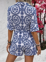 Women's printed tie-waist button-front romper, close-up of blue-and-white print