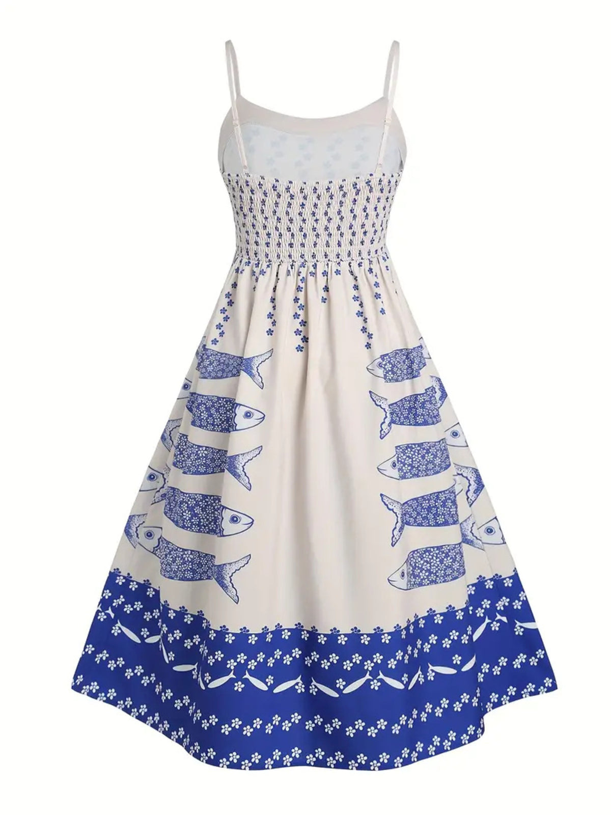 Back product view of a white spaghetti-strap dress with blue motifs and a deep blue patterned hem.