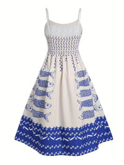 Back product view of a white spaghetti-strap dress with blue motifs and a deep blue patterned hem.