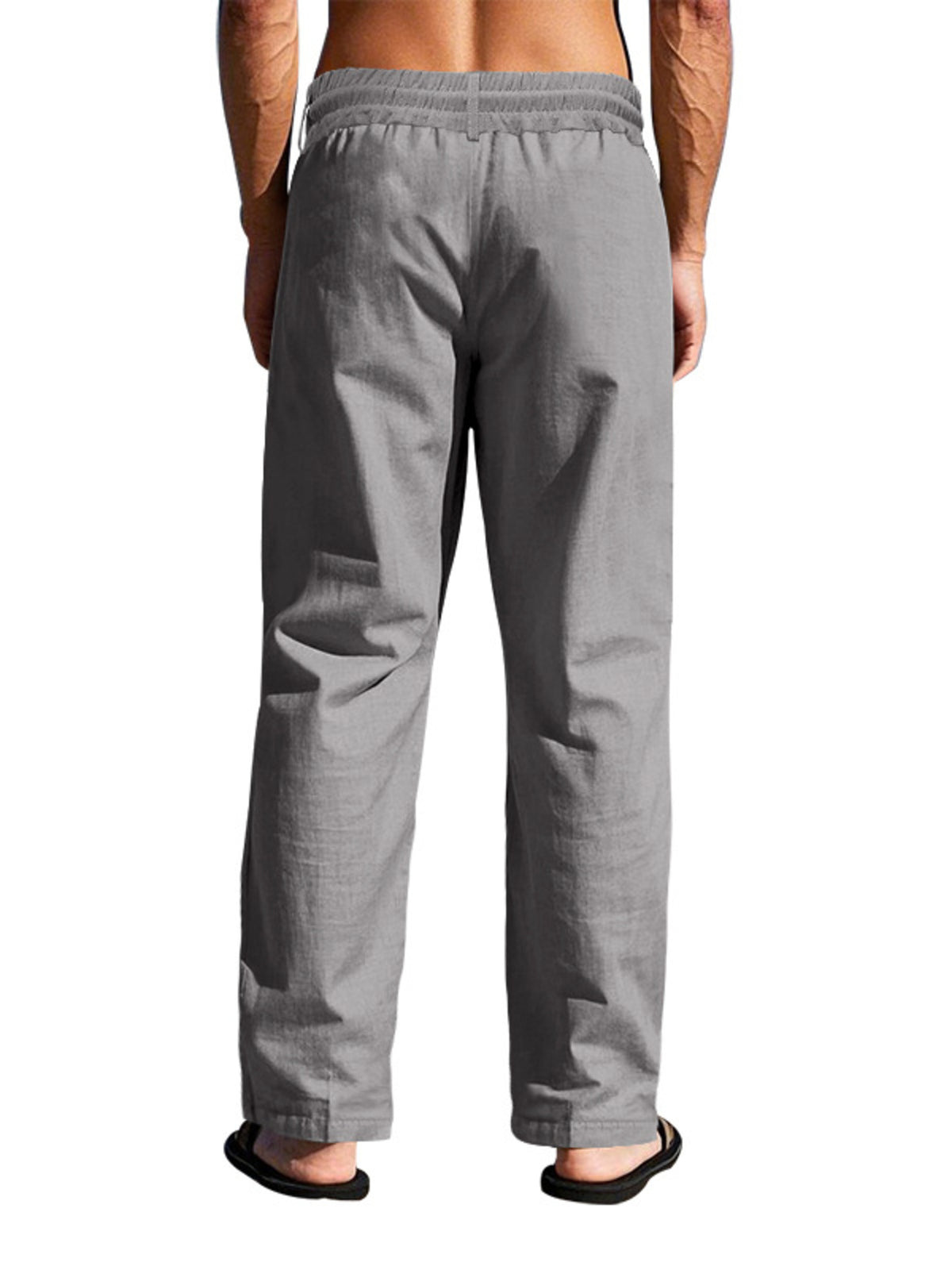 Model wearing gray pants from behind