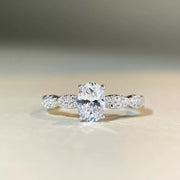 Sterling silver oval ring displayed at an angle