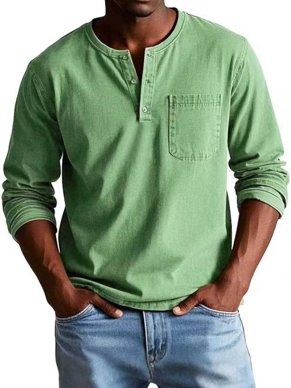 Model wearing the green long-sleeve top