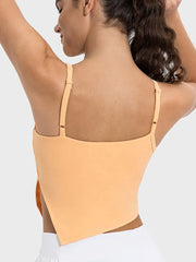 Peach active cami shown from the back with slim shoulder straps