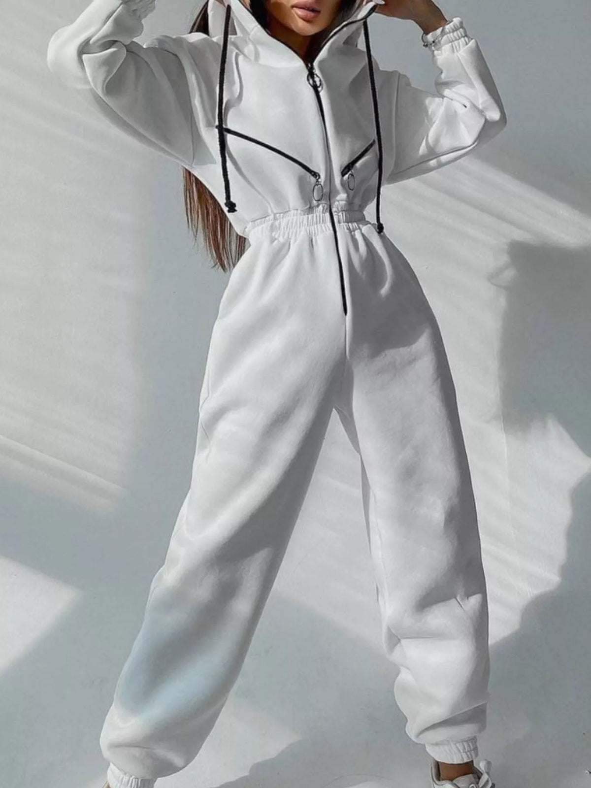 Women's hooded zip-up long-sleeve jumpsuit, white front view