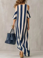 Back view of blue and white striped flowing maxi dress