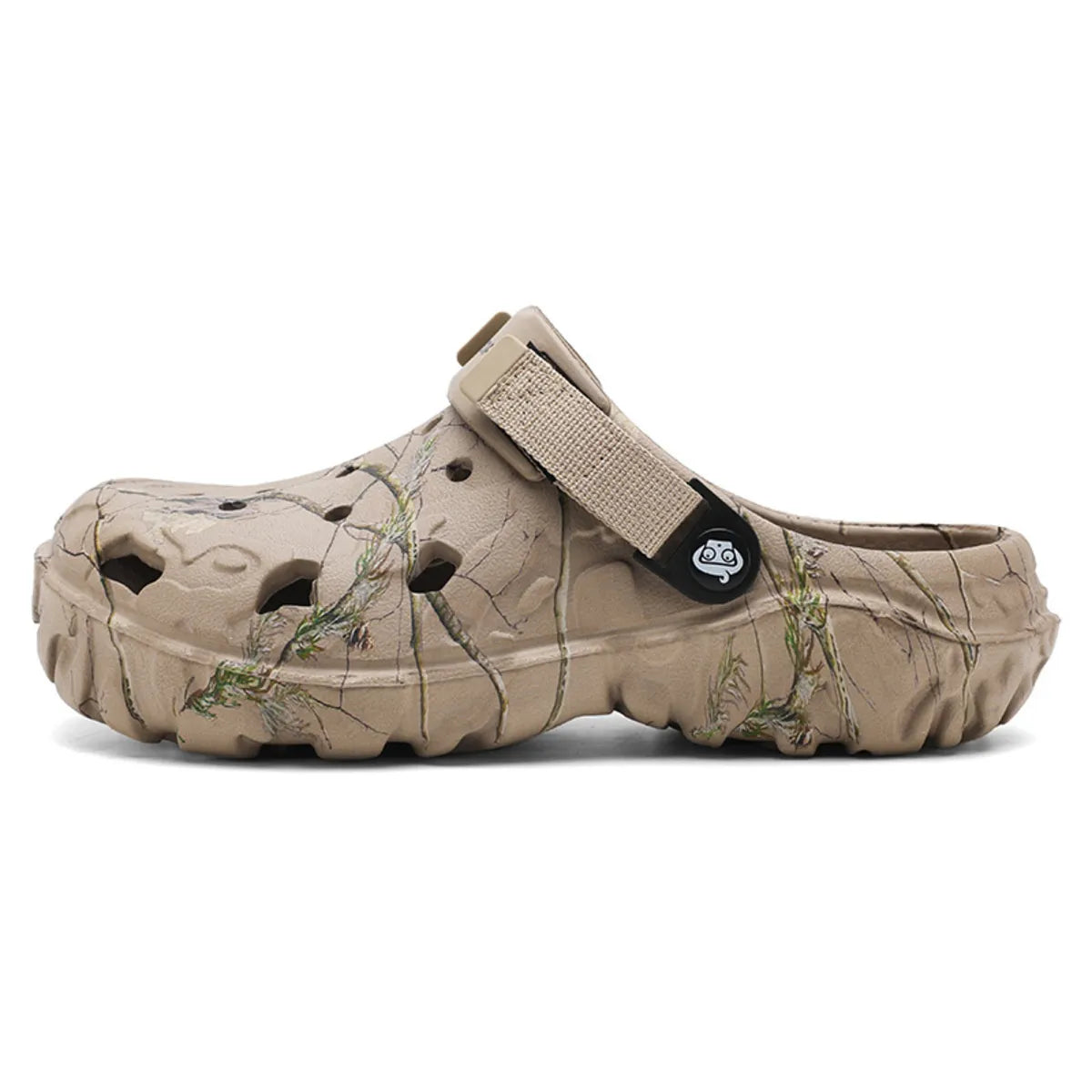 Side profile of a khaki branch-print clog with a deeply textured sole