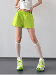 Close view of garment details of elastic waist active shorts