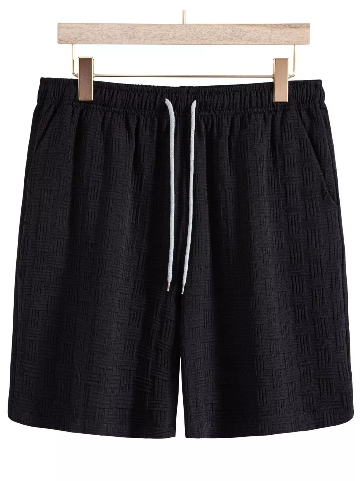 Black textured drawstring shorts, front view