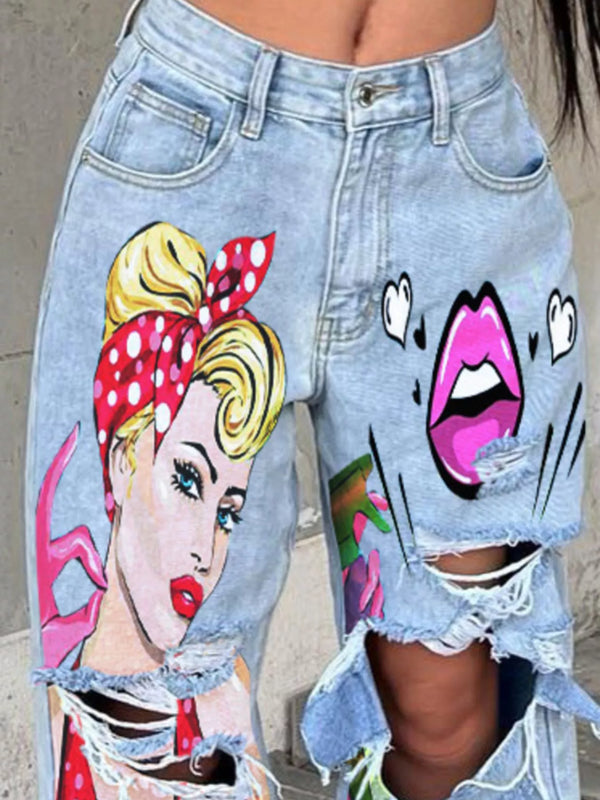 Close-up of blue distressed jeans with colorful comic-style graphic patches
