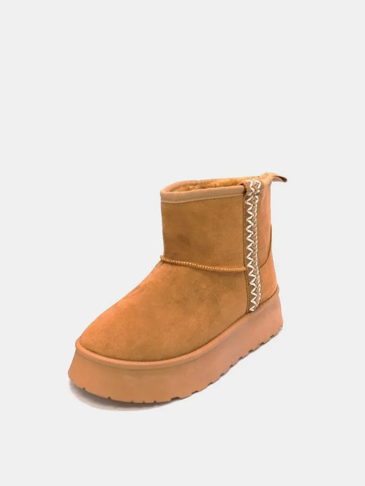 Single tan round-toe platform ankle boot shown from the side