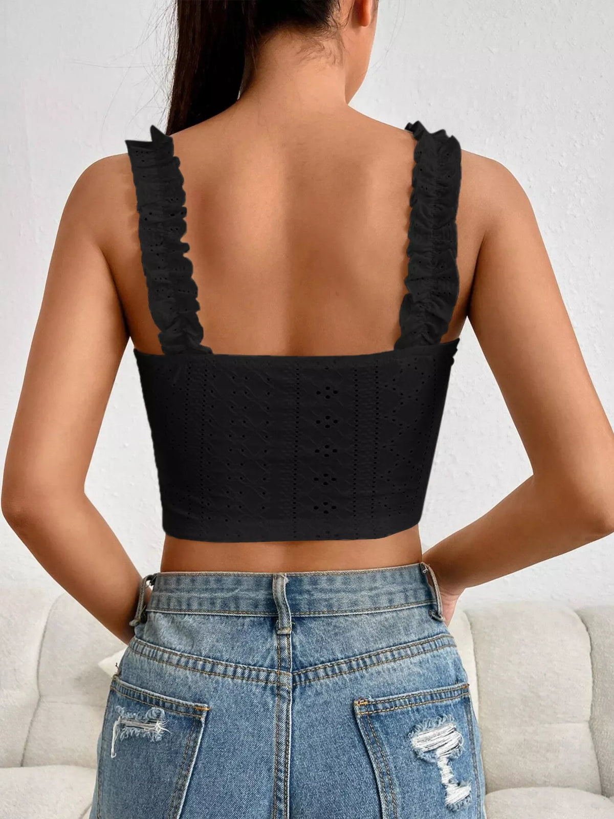Pink eyelet crop tank with ruffled straps, front view