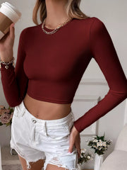 Burgundy long-sleeve cropped top shown from the front