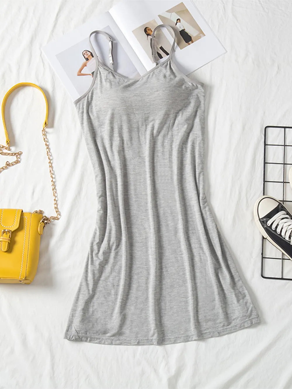 Gray spaghetti-strap cami dress laid flat with a round neckline