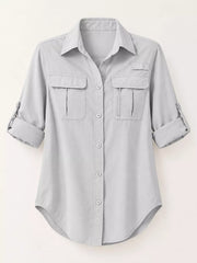 Light gray button-down shirt with chest pockets, front flat lay