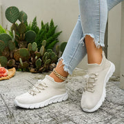 White knit lace-up sneaker shown from side