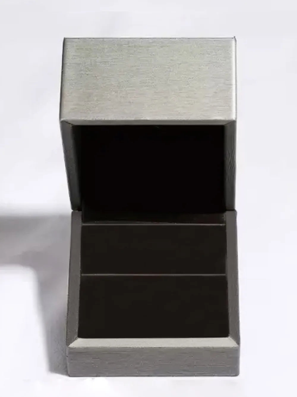 Open grey ring presentation box with a black interior