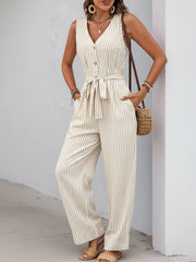 Front view of striped jumpsuit with tie belt