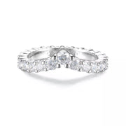Front close-up of the V-shaped ring with a larger center stone.
