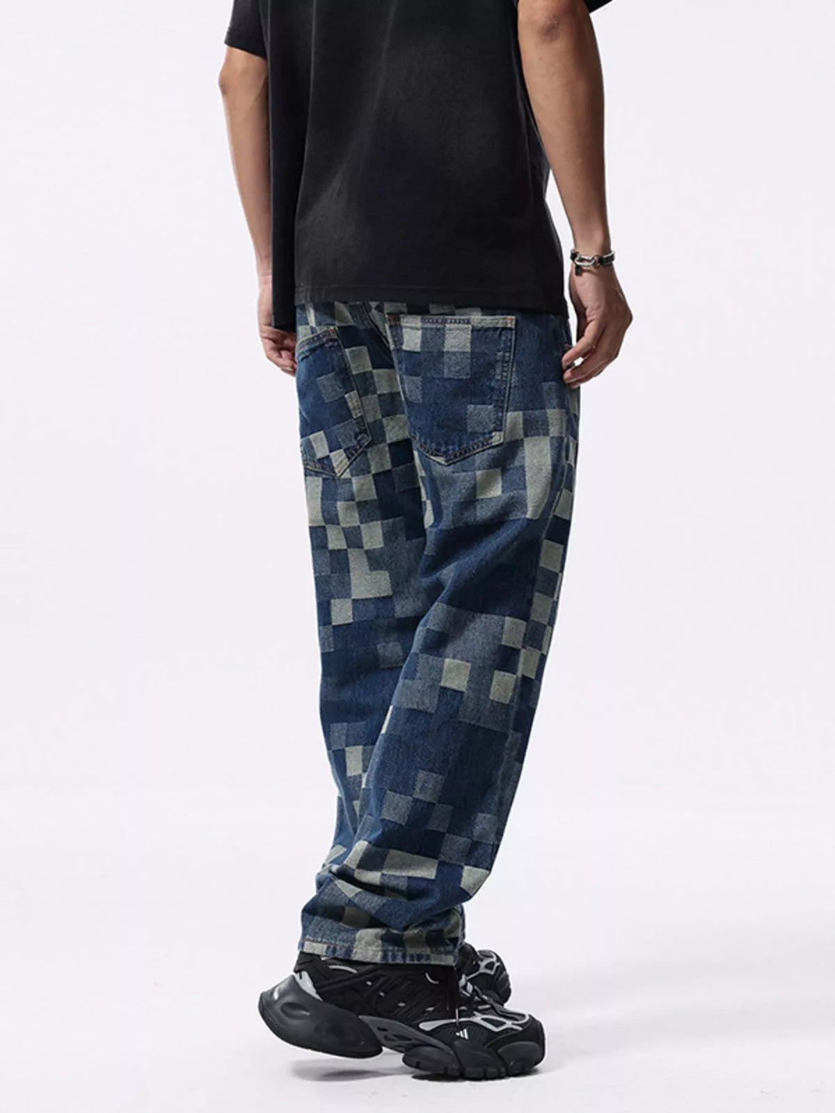 Back view of blue relaxed-fit checkerboard jeans