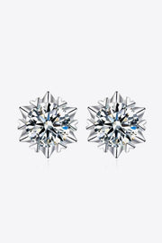 Front view of round clear-stone stud earrings with pointed silver-tone surrounds