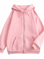 Front view of the pink oversized zip-up hoodie with drawstring hood and front pockets