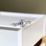Oval lab-created stone ring in sterling silver shown from above