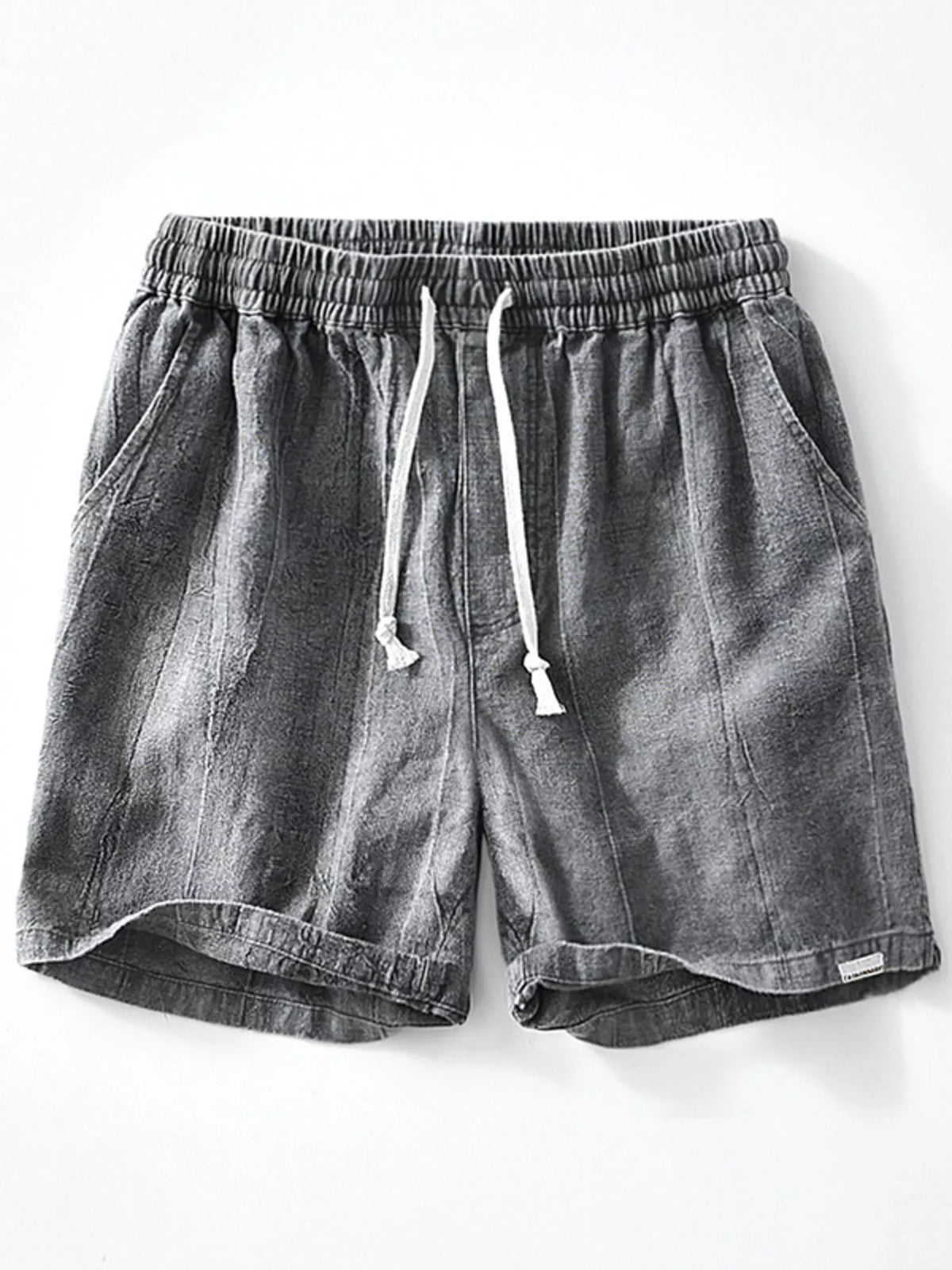 Front view of gray washed shorts with drawstring waist