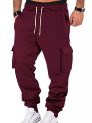 Model wearing burgundy cargo joggers, front view