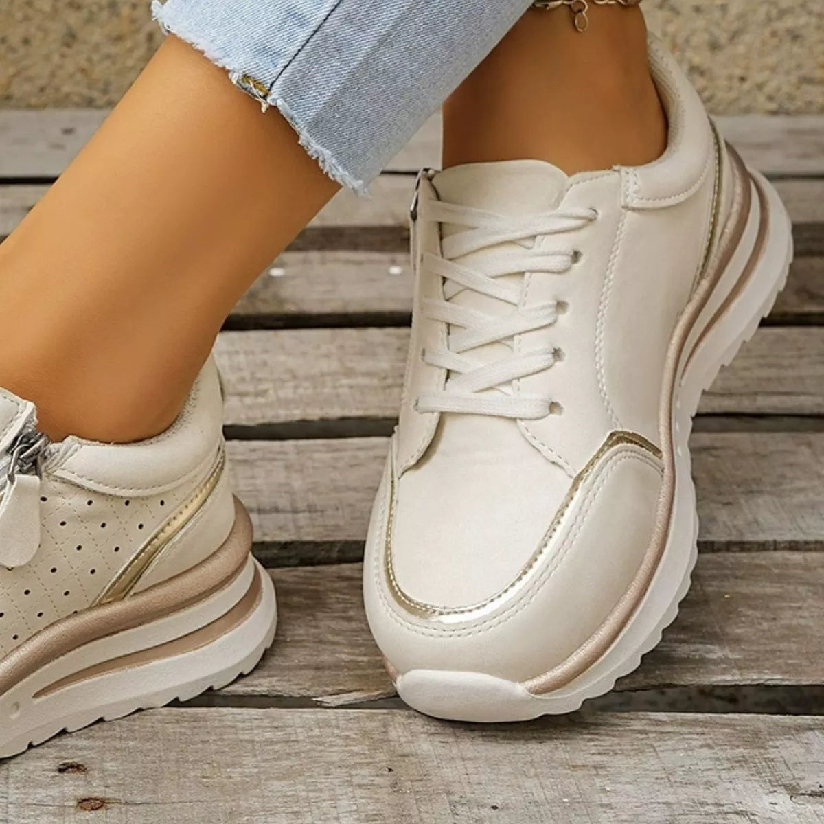 White sneaker with lace-up front, close view