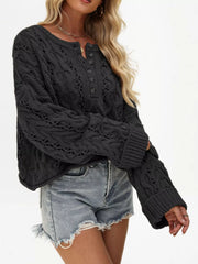 Women’s cable-knit half-button openwork sweater in black side view