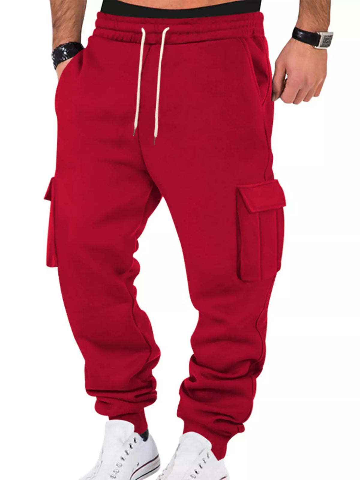 Model wearing red cargo joggers, front view
