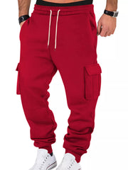 Model wearing red cargo joggers, front view