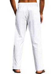 Model wearing white pants, rear view