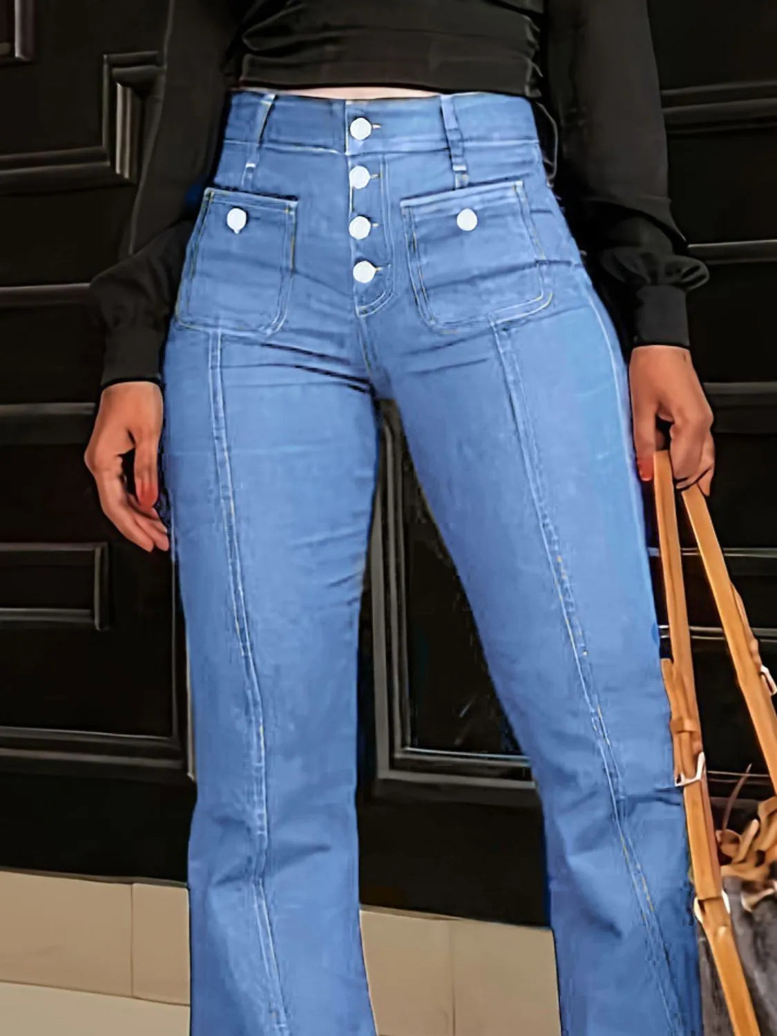 Front view of light blue high-waisted flare jeans