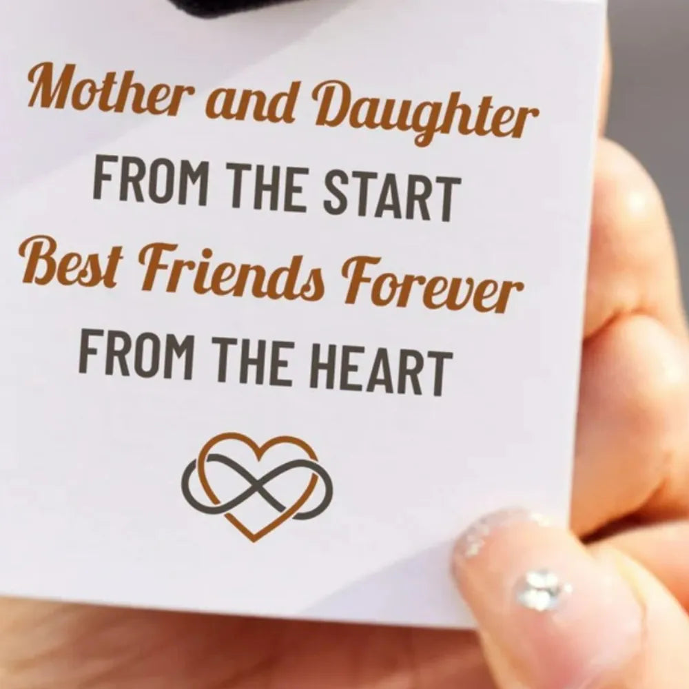 Gift card reading “Mother and Daughter From the Start, Best Friends Forever From the Heart” beside the infinity-heart ring