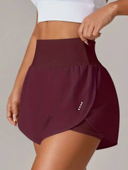 Close side view of burgundy wrap-overlay shorts